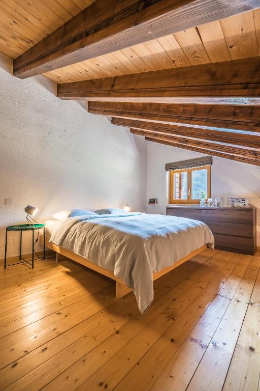 Postel nebo postele na pokoji v ubytování Mirador auf der Sonnenterrasse von Saas-Fee