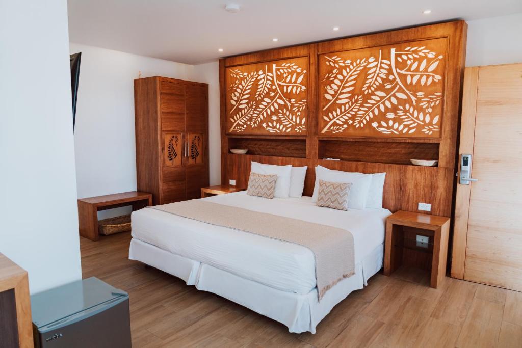 Postel nebo postele na pokoji v ubytování Hotel Acacia