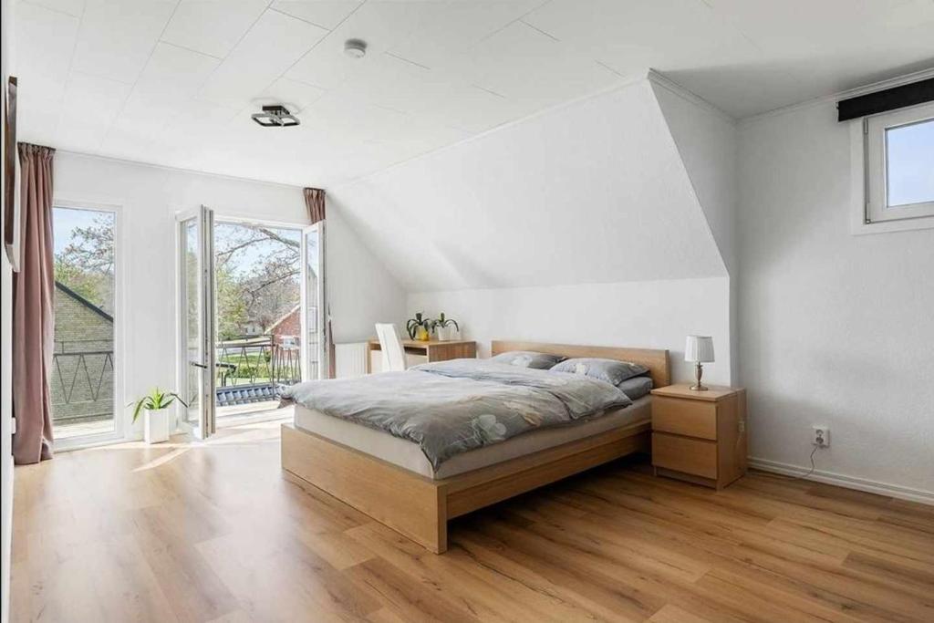 Postel nebo postele na pokoji v ubytování Apartments Smålandsstenar