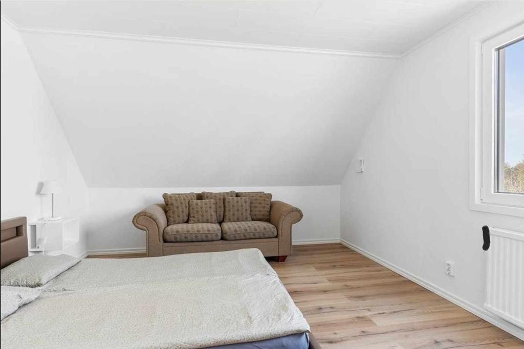 Postel nebo postele na pokoji v ubytování Apartments Smålandsstenar
