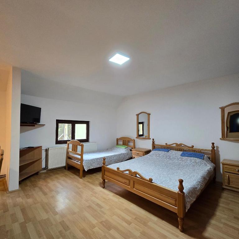 Postel nebo postele na pokoji v ubytování STD "Vila Bor" Stara planina