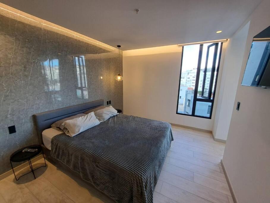 Ένα ή περισσότερα κρεβάτια σε δωμάτιο στο Luxury Penthouse Suite in La Carolina