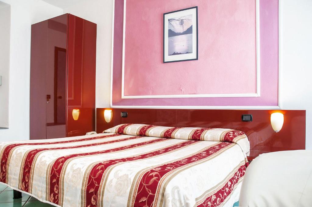 Postel nebo postele na pokoji v ubytování Hotel Annabelle