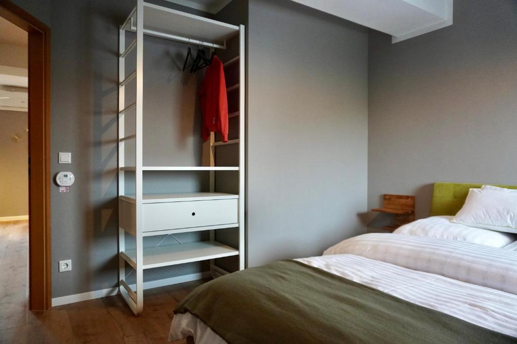 Postel nebo postele na pokoji v ubytování Chez Phéline