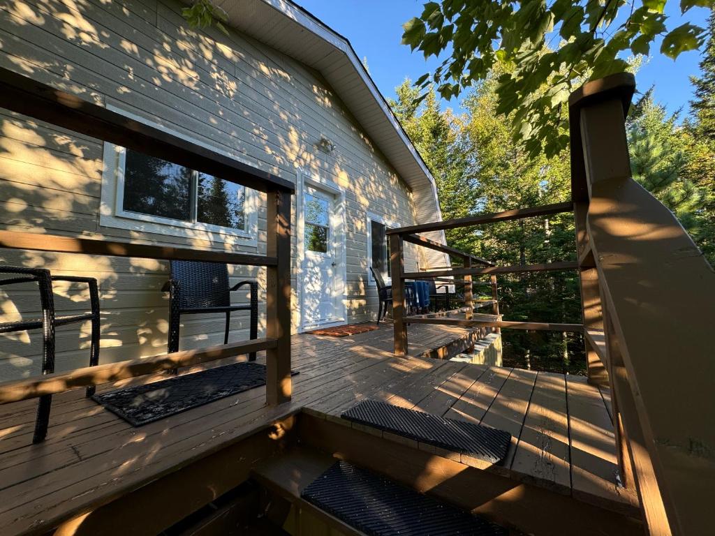 a view of a deck of a house at Loft Nature Laurentides in Val-des-Lacs