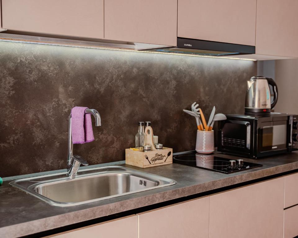 Kuchyň nebo kuchyňský kout v ubytování Bejart Apartment 1