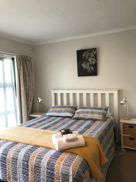 Postel nebo postele na pokoji v ubytování Sahara Motels