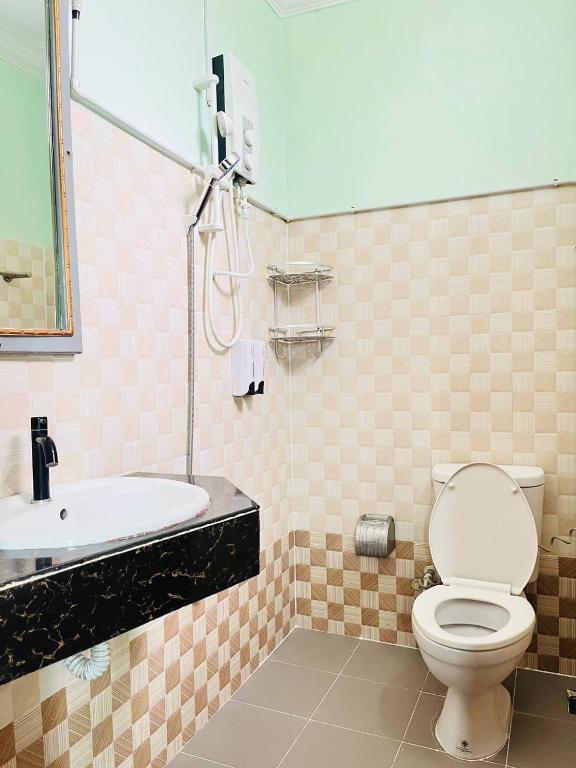 Koupelna v ubytování Por Chey Guesthouse