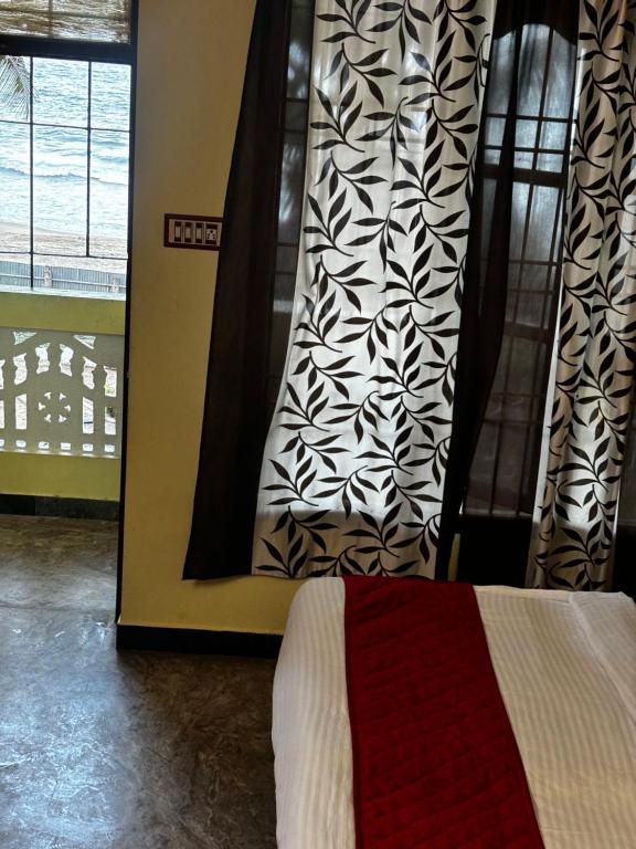 Letto o letti in una camera di La Beach Resort Muthu