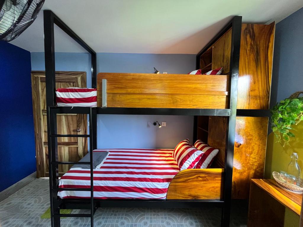 Postel nebo postele na pokoji v ubytování Por Chey Guesthouse
