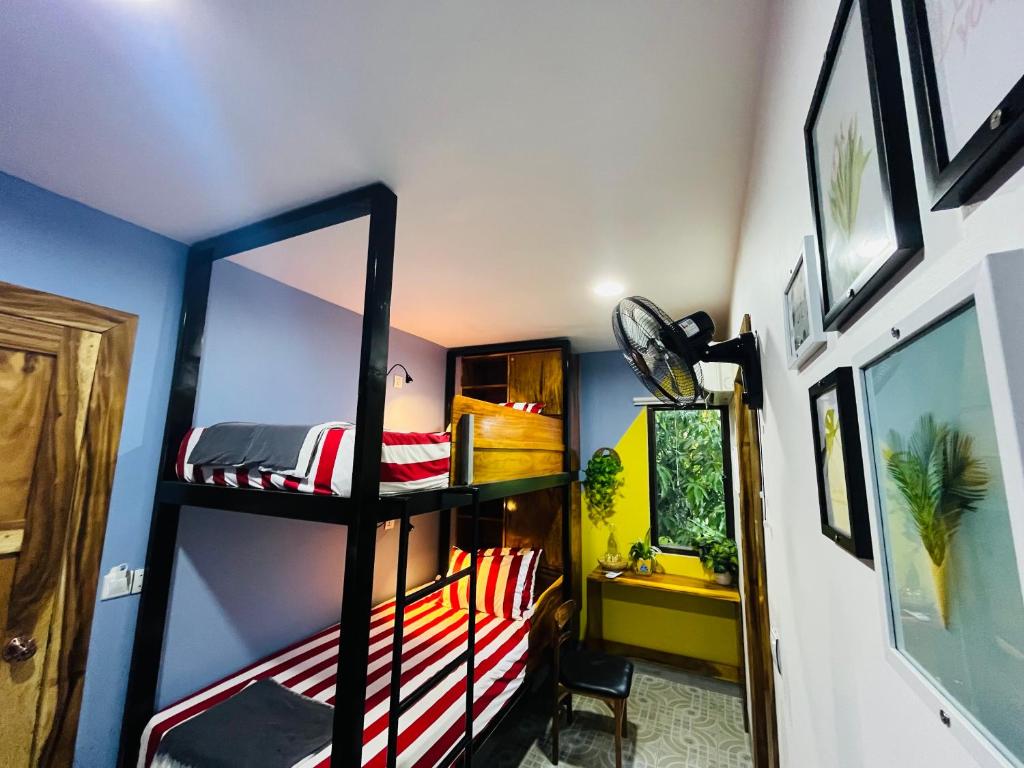 Postel nebo postele na pokoji v ubytování Por Chey Guesthouse