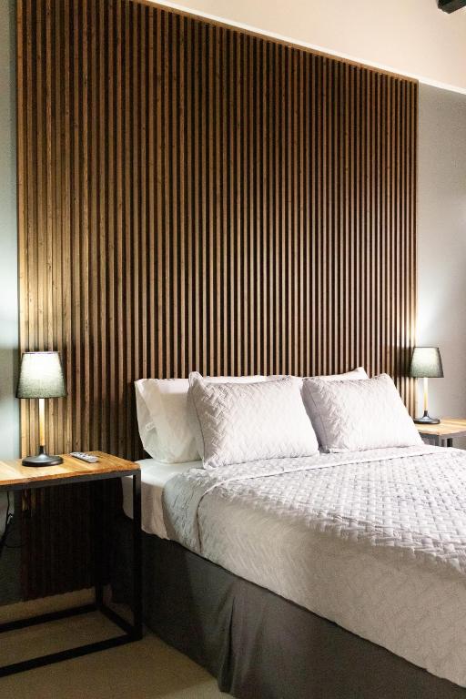 Postel nebo postele na pokoji v ubytování Hotel Boutique Bueso