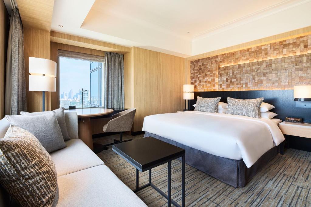 a hotel room with a bed and a desk at Cerulean Tower Tokyu Hotel, A Pan Pacific Partner Hotel in Tokyo