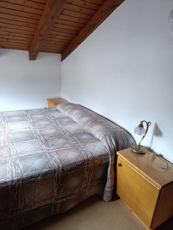 Postel nebo postele na pokoji v ubytování Garnì Bonsai