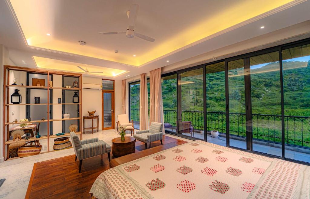 Ένα ή περισσότερα κρεβάτια σε δωμάτιο στο Artisav House-A Luxury Boutique Stay