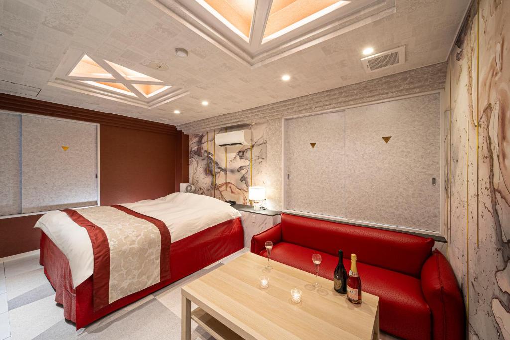 Postel nebo postele na pokoji v ubytování HOTEL X