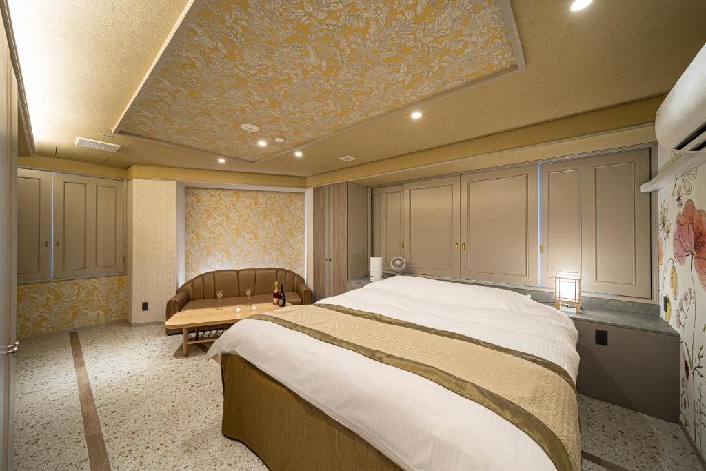 Postel nebo postele na pokoji v ubytování HOTEL X