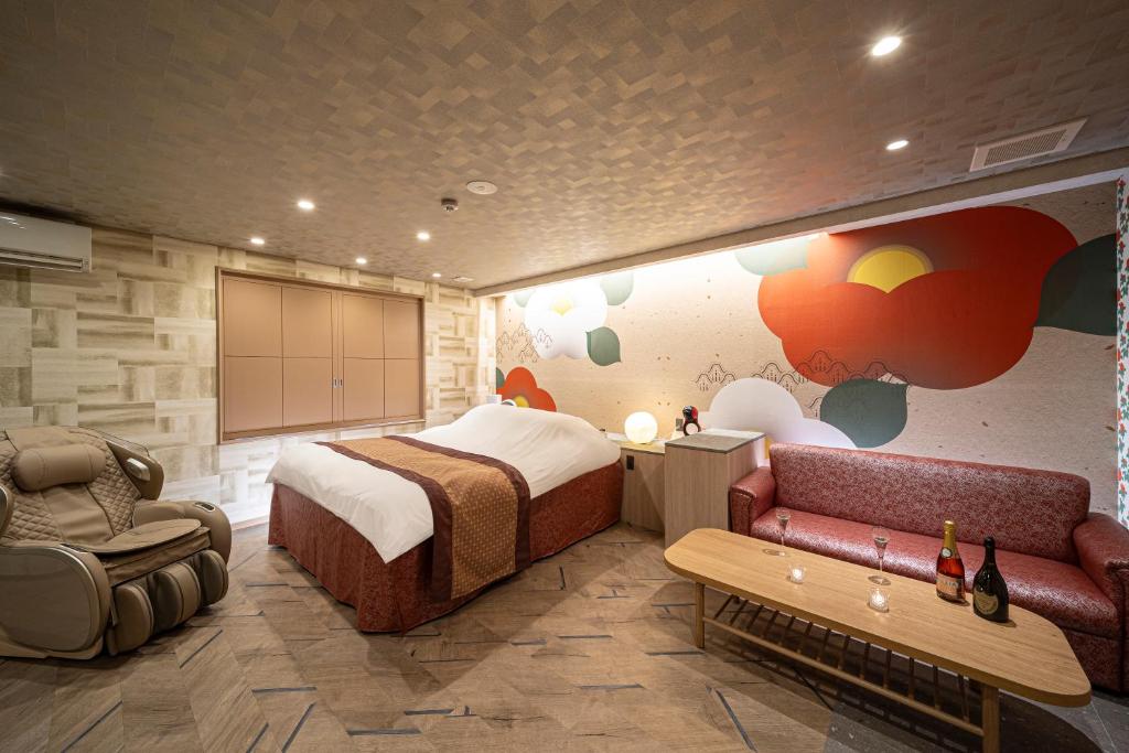 Postel nebo postele na pokoji v ubytování HOTEL X