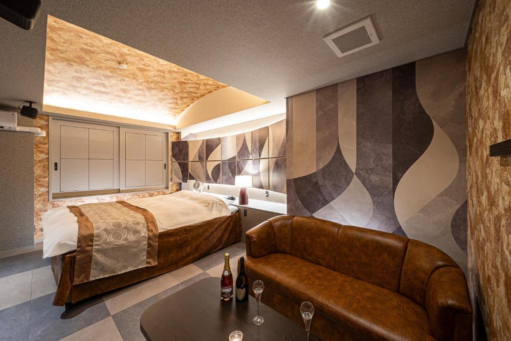 Postel nebo postele na pokoji v ubytování HOTEL X