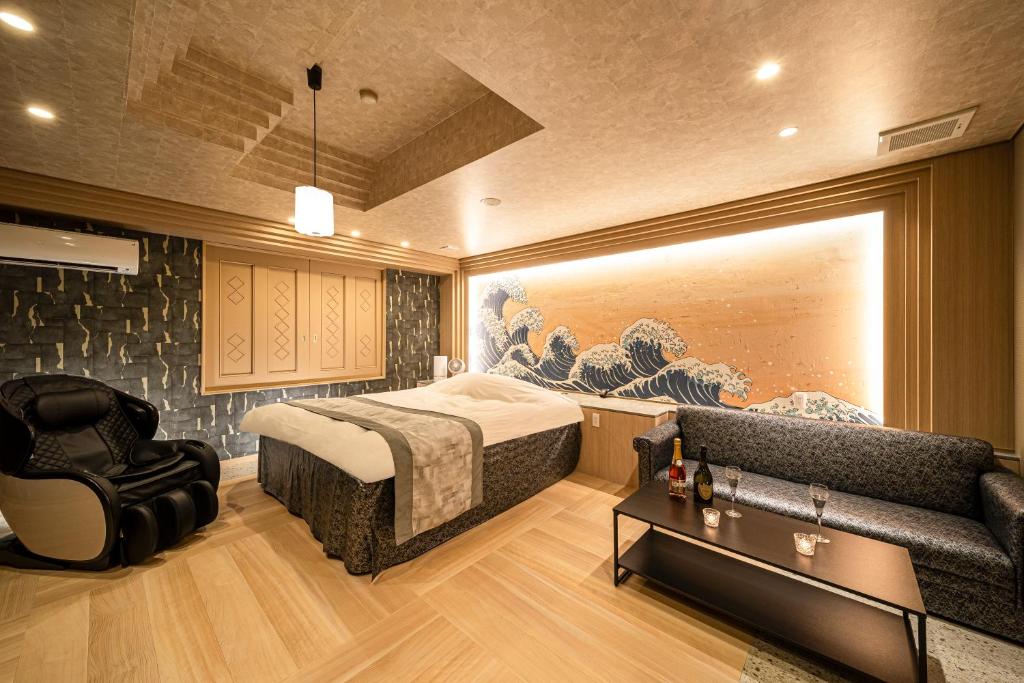 Postel nebo postele na pokoji v ubytování HOTEL X