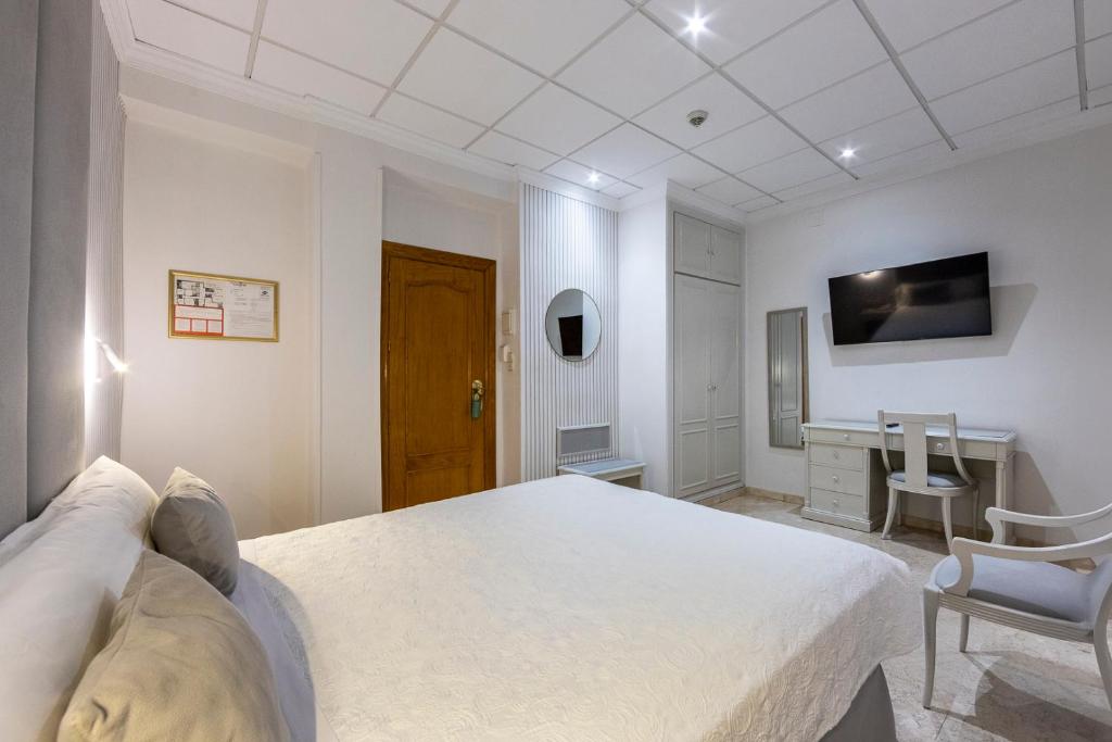TV a/nebo společenská místnost v ubytování Hotel Sacromonte