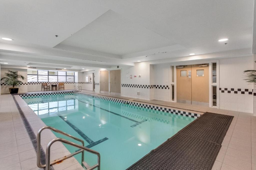 City Hideaway 1 BR Apt with Pool and Gym - Resim 9