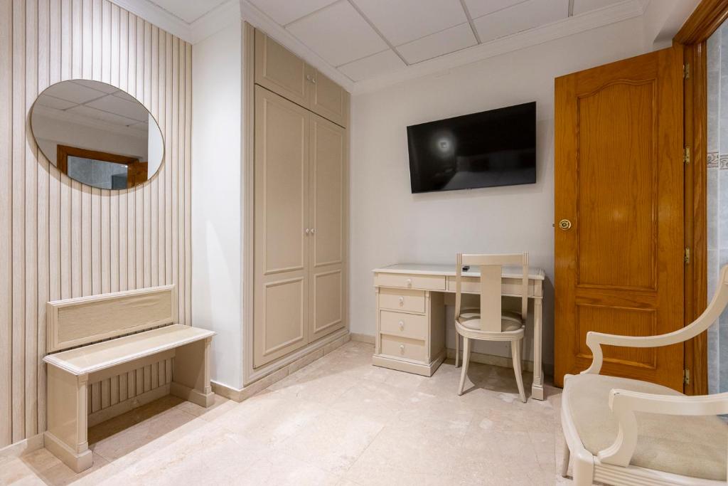 TV a/nebo společenská místnost v ubytování Hotel Sacromonte