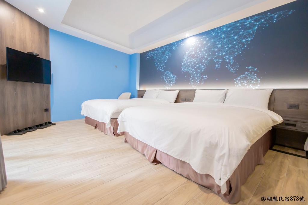 Postel nebo postele na pokoji v ubytování Tropical house Homestay