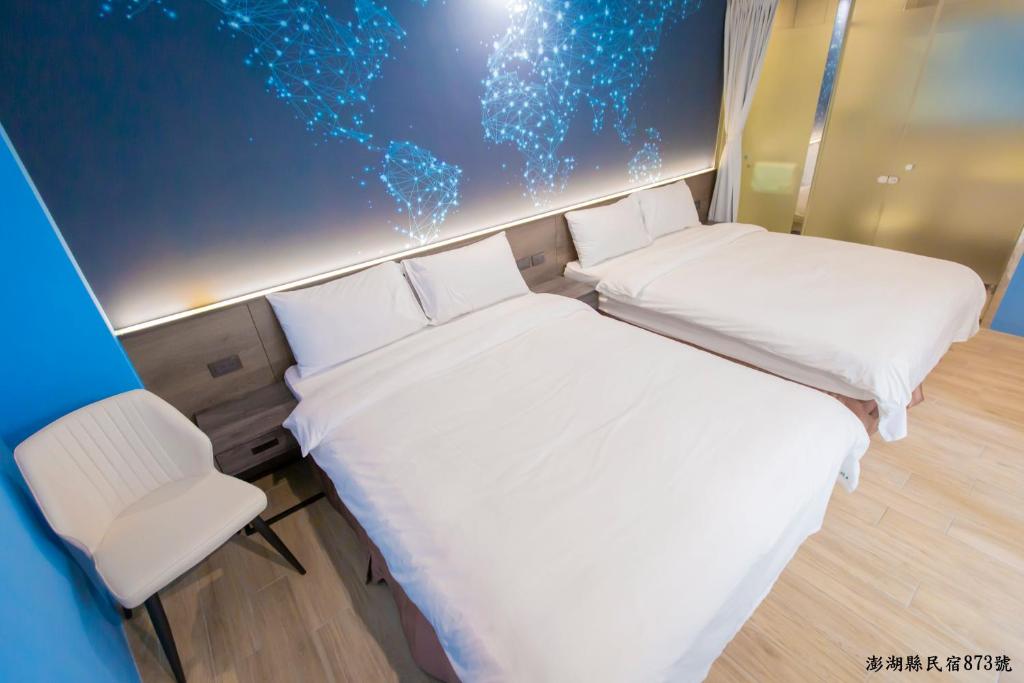 Postel nebo postele na pokoji v ubytování Tropical house Homestay