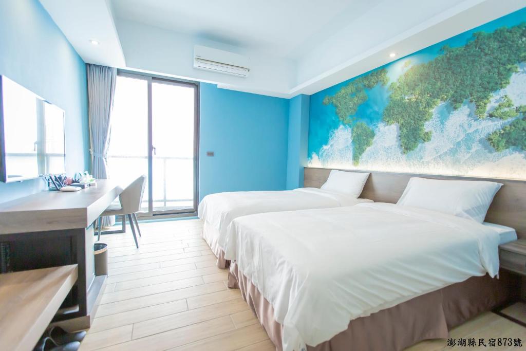 Postel nebo postele na pokoji v ubytování Tropical house Homestay