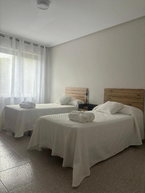 Postel nebo postele na pokoji v ubytování Hotel Juan Manuel