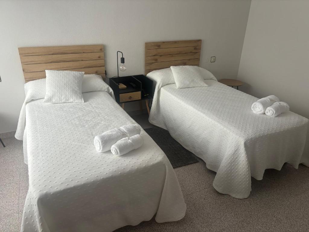 Postel nebo postele na pokoji v ubytování Hotel Juan Manuel