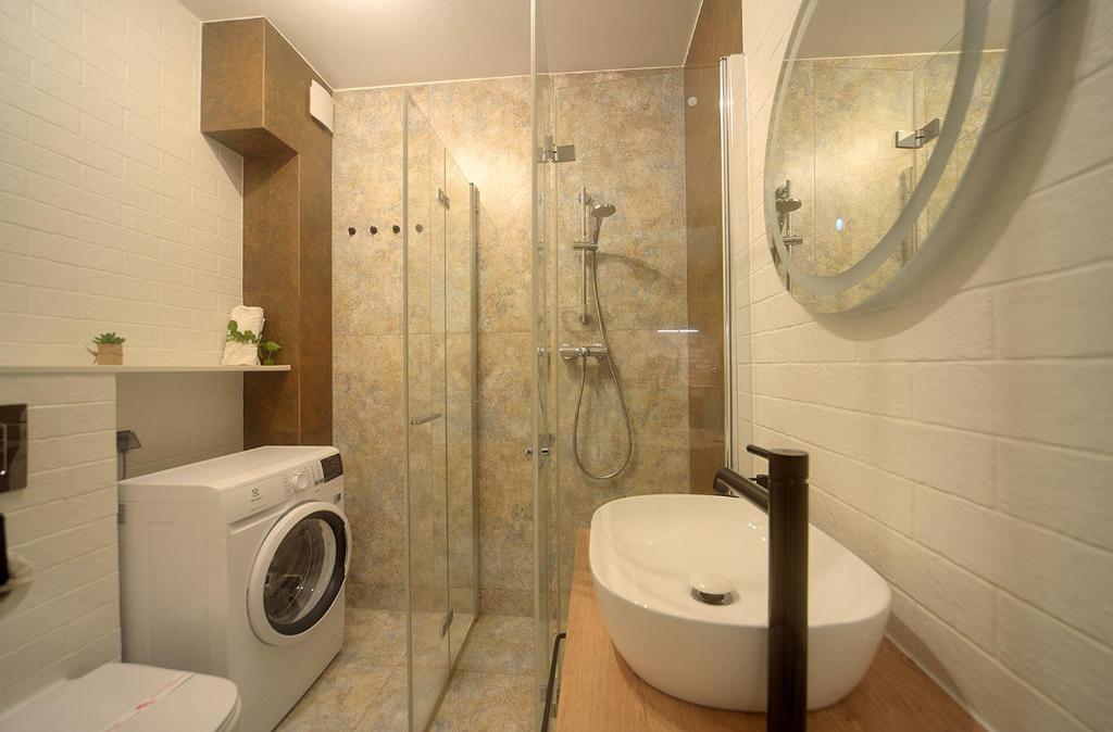 Kúpeľňa v ubytovaní Trevilles Apartamenty Pogodny