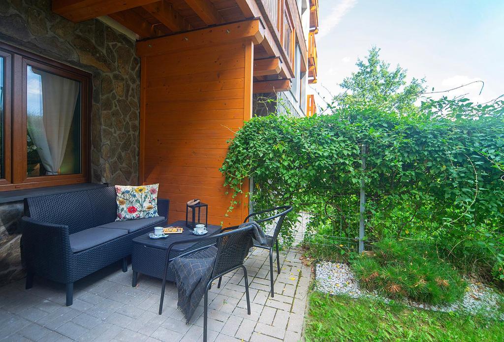 Vonkajšia záhrada v ubytovaní Trevilles Apartamenty Pogodny
