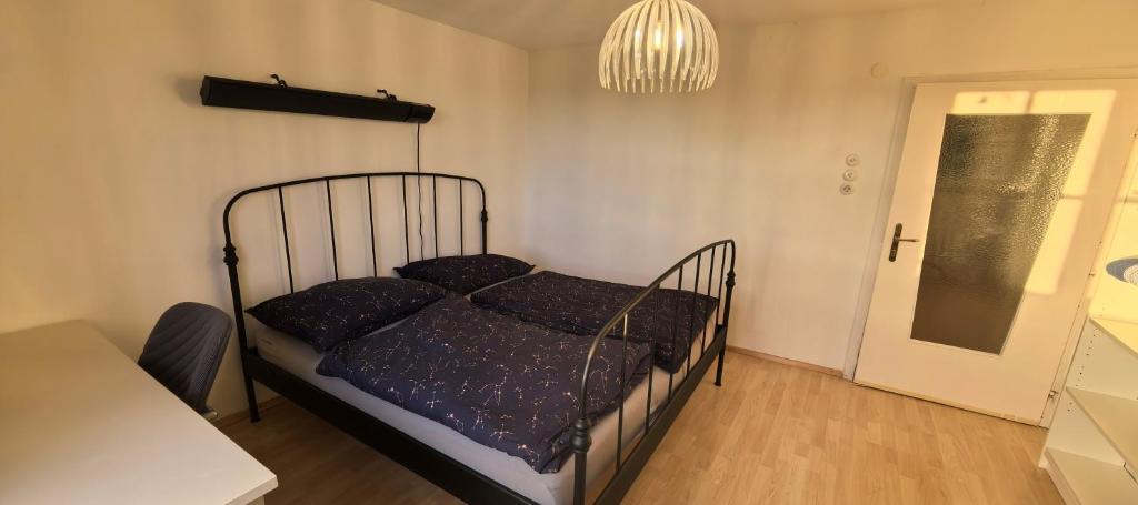 Postel nebo postele na pokoji v ubytování Landhaus auf der Alm