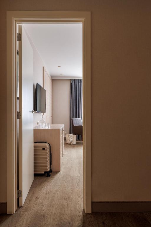 TV a/nebo společenská místnost v ubytování Hotel Aazaert by WP Hotels