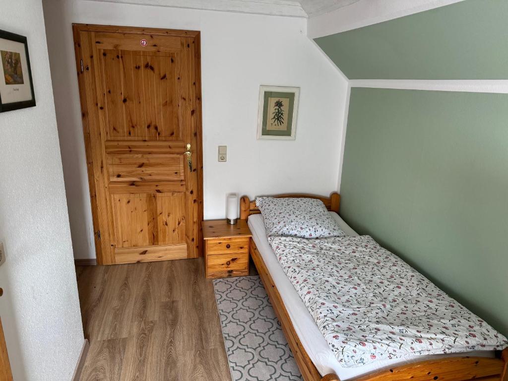 Postel nebo postele na pokoji v ubytování Bartke Zimmervermietung