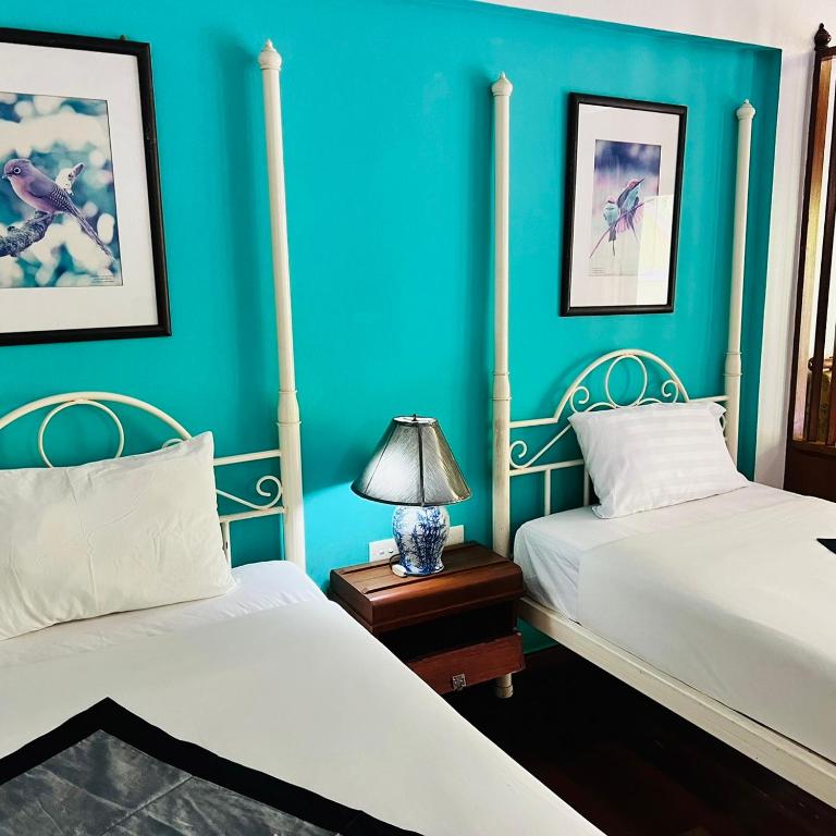 Postel nebo postele na pokoji v ubytování Successive Resort ,Krabi