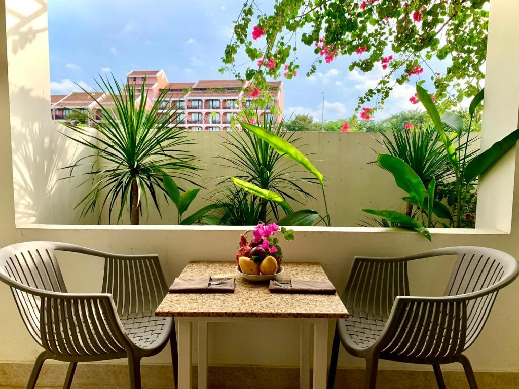 Balkón nebo terasa v ubytování De Vivre Hoi An Hotel