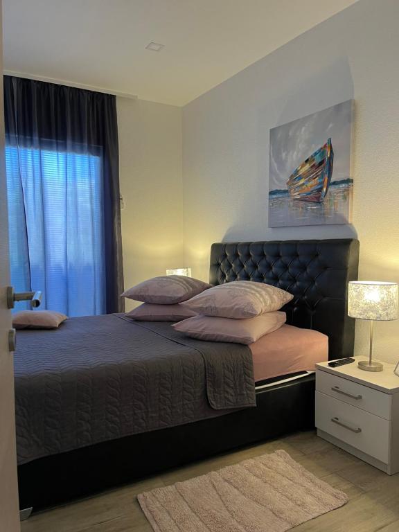 Katil atau katil-katil dalam bilik di Apartman IVA