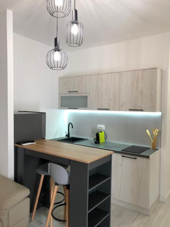 Kuchyň nebo kuchyňský kout v ubytování M&M apartments