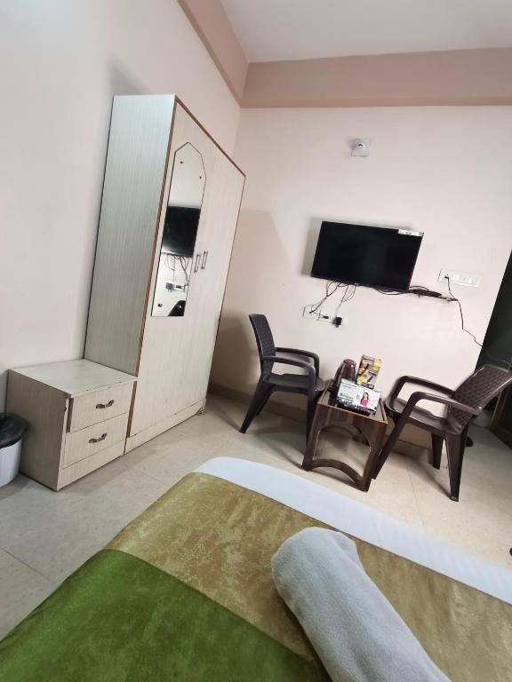 TV a/nebo společenská místnost v ubytování Hotel Bay Beach Inn