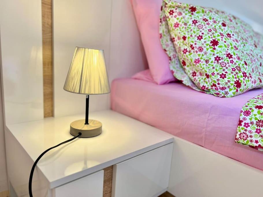 Postel nebo postele na pokoji v ubytování Cozy Apartment in Central Varna