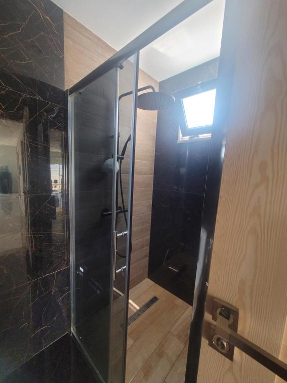 Koupelna v ubytování Appartement avec piscine vue sur mer