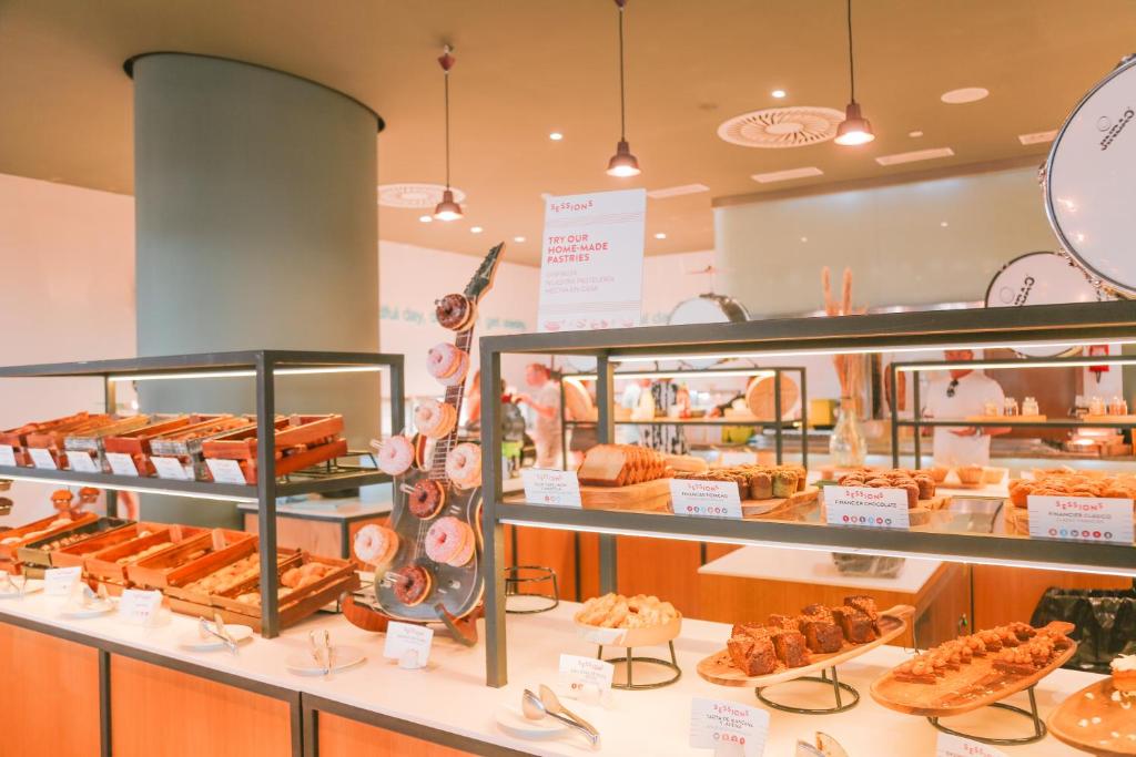a bakery with many different types of pastries on display at Hard Rock Hotel Ibiza in Playa d'en Bossa
