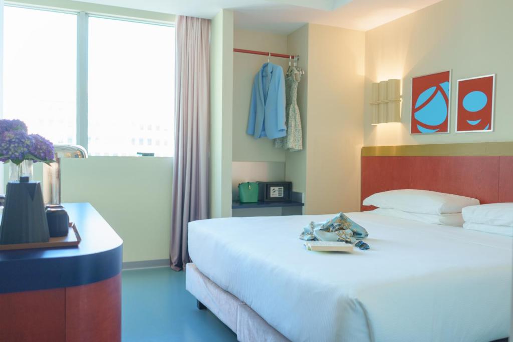 Postel nebo postele na pokoji v ubytování Moderno Hotel Roma