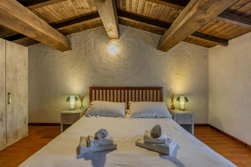 Postel nebo postele na pokoji v ubytování Residence San Michele
