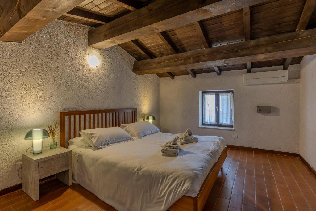 Postel nebo postele na pokoji v ubytování Residence San Michele