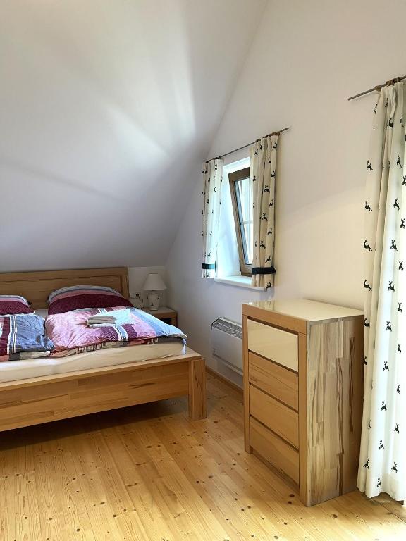 Postel nebo postele na pokoji v ubytování Almhütte-Flattnitz