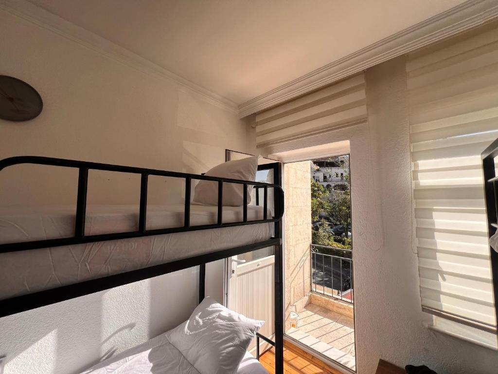 Postel nebo postele na pokoji v ubytování Göreme Hostel